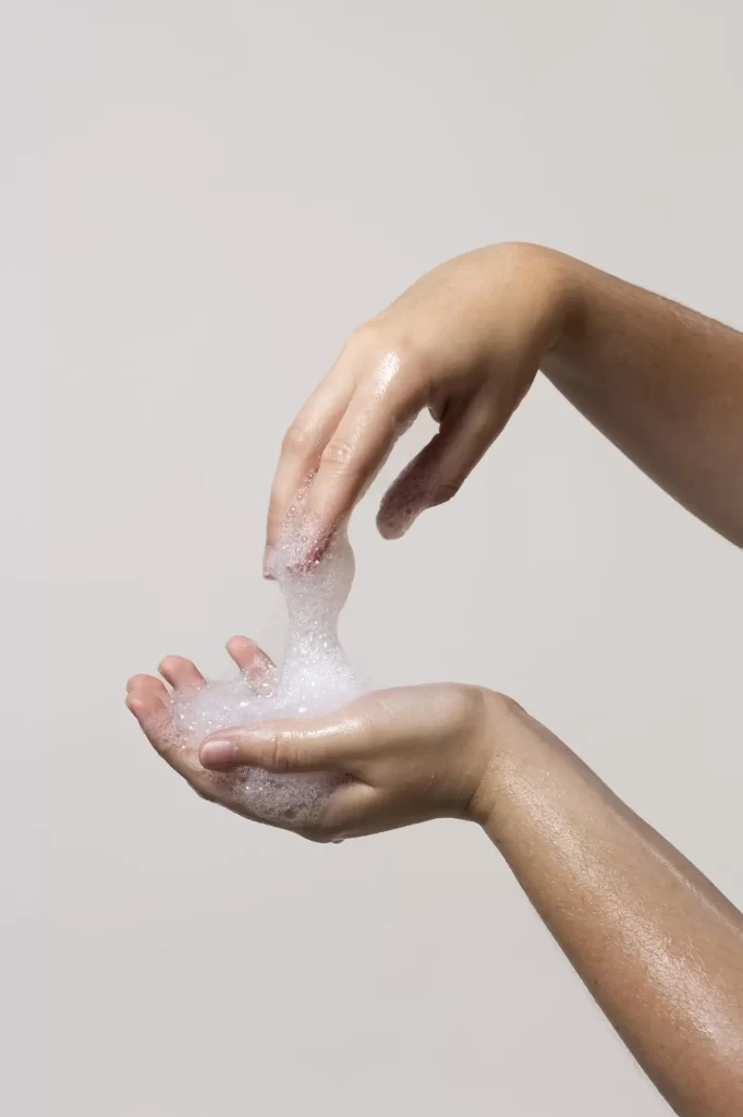 caucasian-person-washing-hands-isolated-white