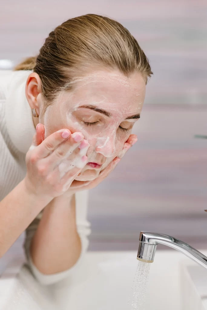 prevention-wash-face-with-antibacterial-soap-running-water-sink-washing-face